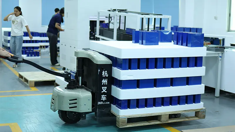 Grade-A prismatic cells arriving on pallets at the assembly line